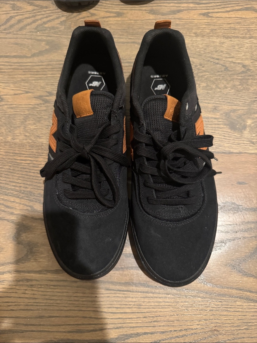 New Balance Men's Black Sneakers with Tan Accents